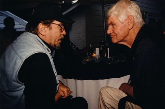 Harlan Howard with Waylon Jennings at his seventieth birthday party in 1997